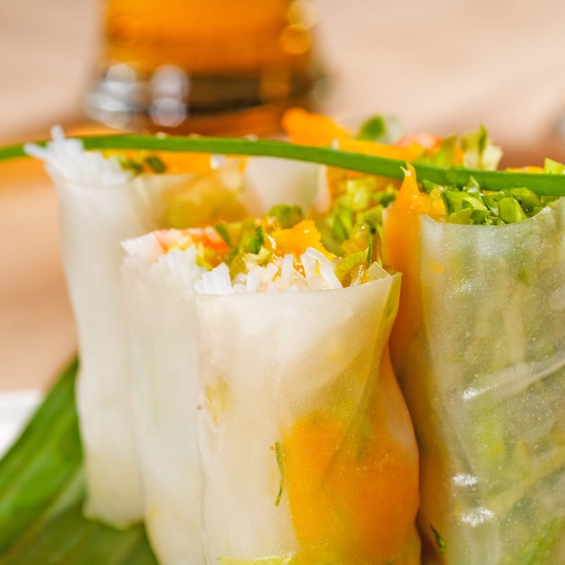 fresh tipycal vietnamese style summer rolls,on a palm leaf